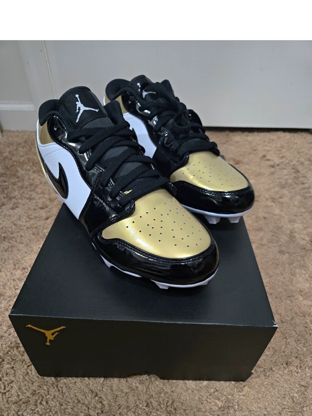 Jordan Men’s Black/Gold/White Low-Top Athletic Cleats